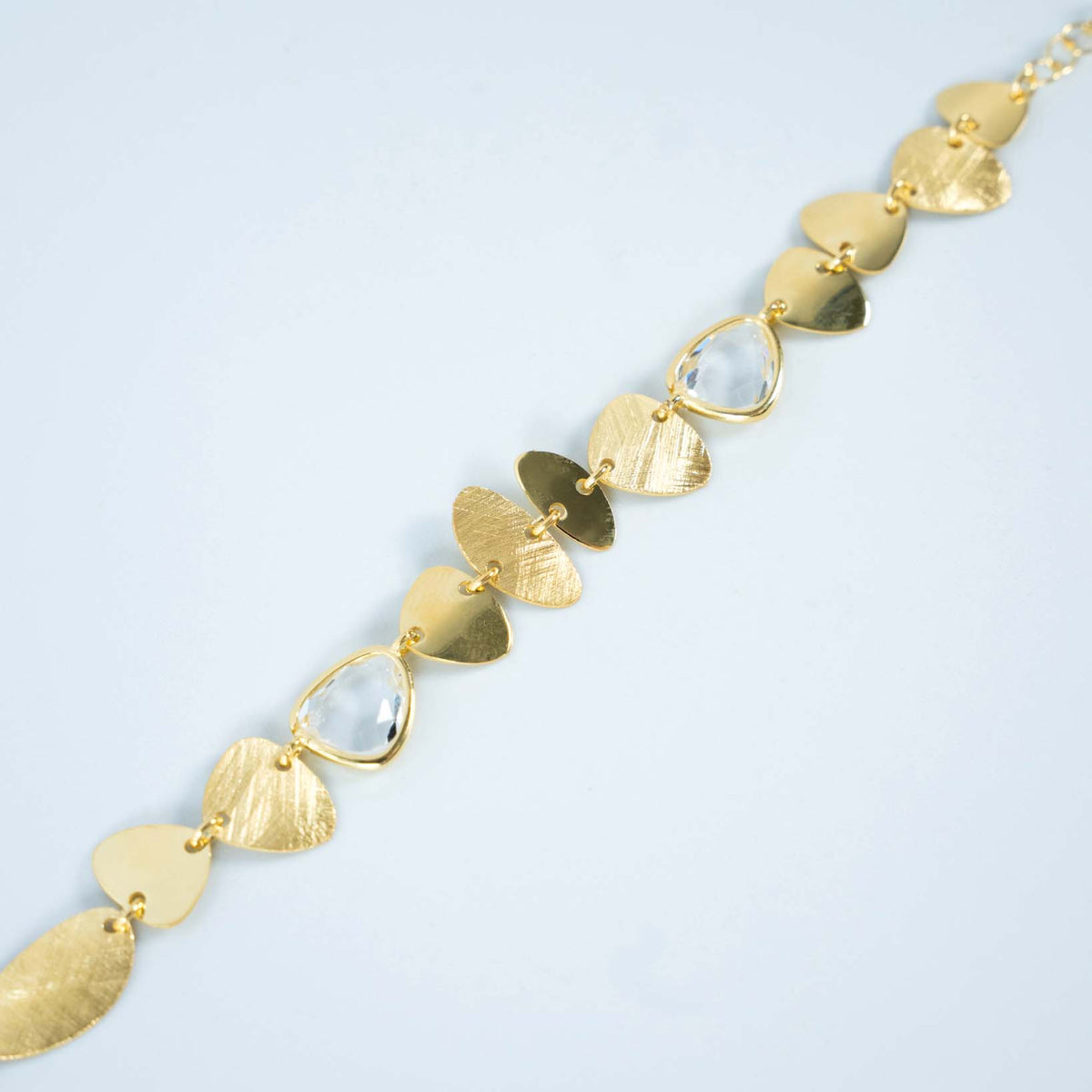 Bracciale oro satinato e lucido con quarzi