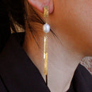 Orecchini con perla di acqua dolce