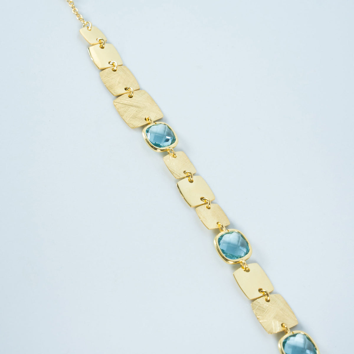 Bracciale oro con quarzi azzurri