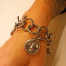 Bracciale in argento brunito con monete