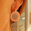 Orecchini con bachelite e zirconi