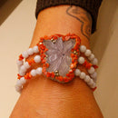 Bracciale elastico in calcedonio e corallo rosso