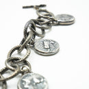 Bracciale in argento brunito con monete