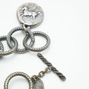 Bracciale in argento brunito con monete