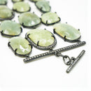 Bracciale in argento nero con pietre verdi