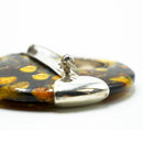 Spilla in ambra e argento