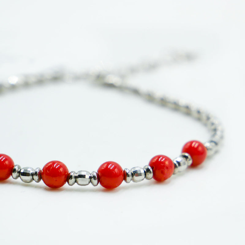 Bracciale in argento rodiato con corallo rosso