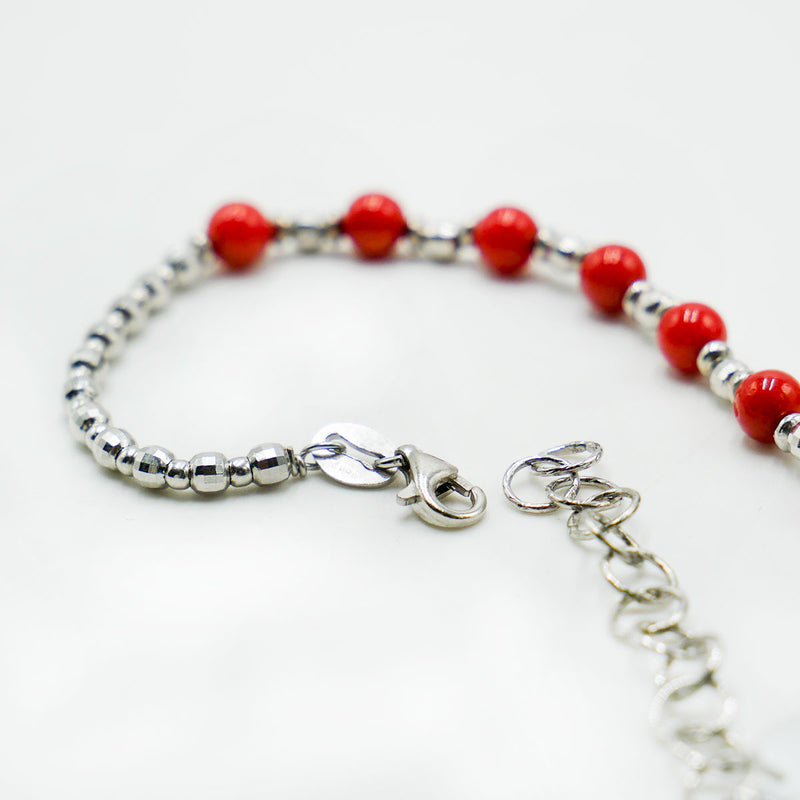 Bracciale in argento rodiato con corallo rosso