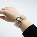 Bracciale a 5 fili con quarzo rosa, cammeo e tormaline