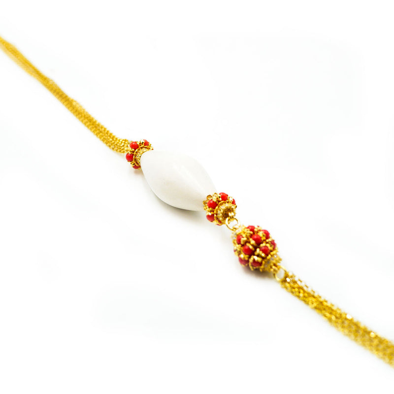 Collana con corallo rosso italiano, zirconi e ebano bianco