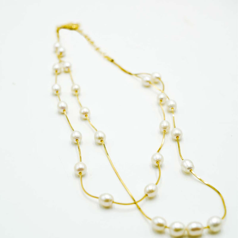 Collana a due fili scalati di perle